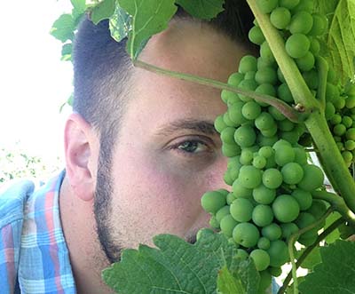 <p>A native of Grand Rapids, Michigan, Stover dove into the hospitality and tourism fields after he graduated from George Washington University. His travels have taken him to such great wine-producing areas as Argentina, Australia, Brazil, Chile, France, Germany, New Zealand, South Africa, Spain and even the UK. After holding a part-time job at the tasting room at Breaux Vineyards in Hillsboro, Virginia, Stover enrolled in the Certified Sommelier program with the International Sommelier Guild and landed at DC’s OYA Restaurant & Lounge as Wine Director. In 2009, he launched a wholesale wine portfolio and brand called Vino50 with importer and distributor, Siema Wines, created to encourage consumers to explore local and regional wines. Vino50 celebrates the 50 States of Wine and Stover collaborates with wineries in budding wine regions to show consumers that fine wines can come from states other than California. Today the Vino50 portfolio represents over 20 wineries from 13 different US states.</p>
