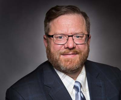 <p>Dr. Michael Wray is a Professor of Restaurant Management at the Metropolitan State University of Denver. His credentials include a Sommelier Diploma with the International Sommelier Guild, Certified Culinary Instructor, Certified Wine Specialist with the Society of Wine Educators, and Master Certified Food Service Executive. As a Professor at Metro State, Michael has garnered a strong following of students that appreciate his interactive learning environment that fosters a love for food, wine, beer, and spirits in tandem. As a Chef and Sommelier, Dr. Wray is active in the food and beverage industry by consulting with companies in restaurant design, menu and recipe development. He holds Bachelors in Nutrition and Foods from Virginia Tech, an MBA from Salisbury University and a PhD in Education Leadership at the University of Colorado, Denver.</p>